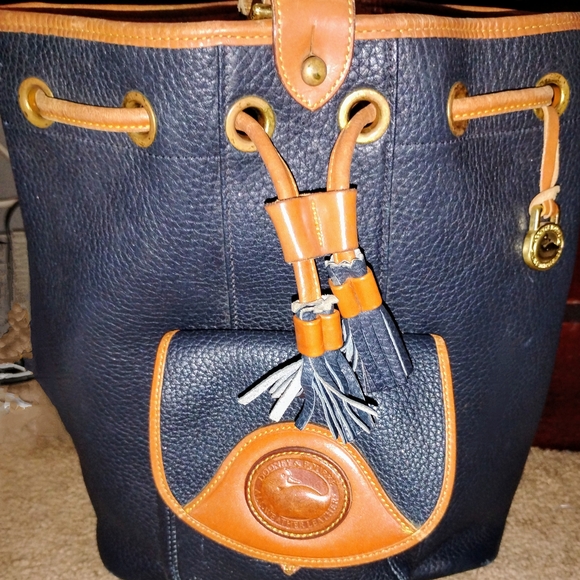 Dooney & Bourke Handbags - Dooney & Bourke Navy and Tan Leather Drawstring Bucket Bag
